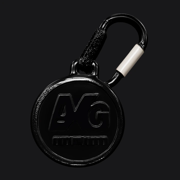 Round keychain magnetic hook with AXG logo. smooth edges, simple geometry, game-ready.
