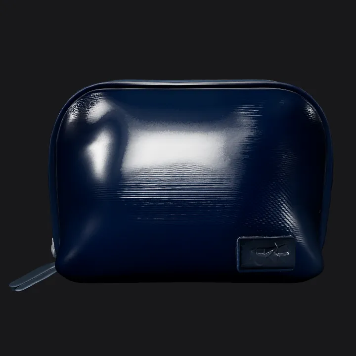 Small black toiletry bag on desk. smooth edges, simple geometry, symmetric geometry.